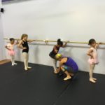 children learning ballet