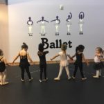 a group of children in a ballet class