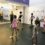 a group of girls in a dance class