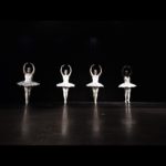 four ballet dancers on stage
